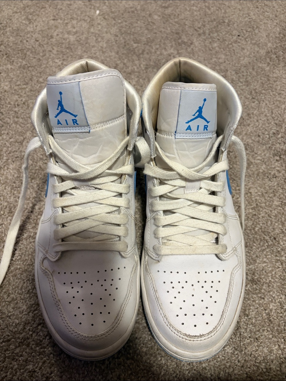 Jordan White Sneakers with Light Blue Jumpman Accents